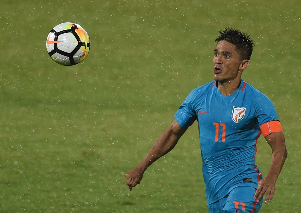 India captain Sunil Chhetri vies for the ball during the Hero Intercontinental Cup football match between India and Kenya in Mumbai on June 4, 2018.  AFP / Punit Paranjpe