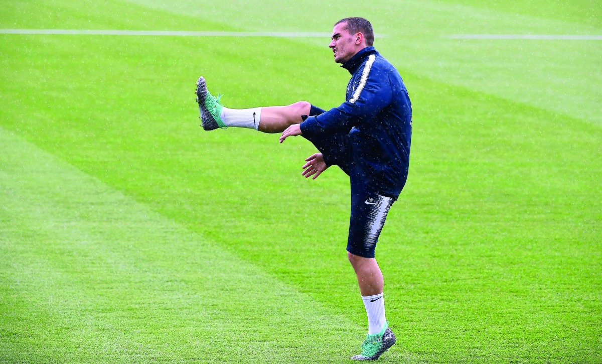France's forward Antoine Griezmann stretches during a training session at the Glebovets Stadium in Istra, some 70 km west of Moscow, on June , 2018, ahead of the Russia 2018 World Cup football tournament. AFP / Franck Fife

