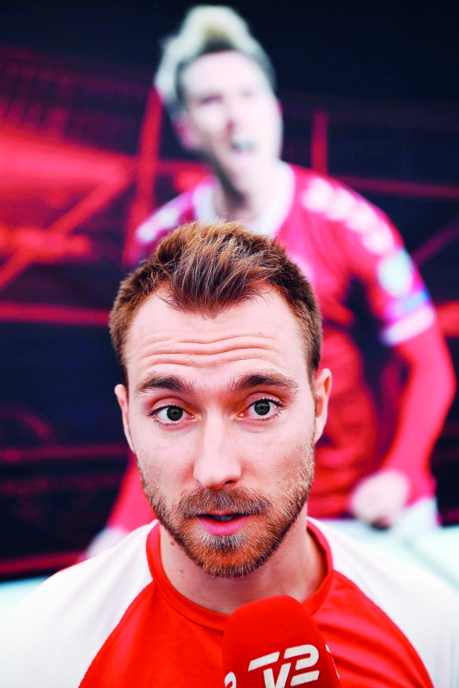 Denmark's midfielder Christian Eriksen speaks to the press after a training session on June 12, 2018, in Vityazevo ahead of the Russia 2018 World Cup football tournament. AFP / Jonathan Nackstrand