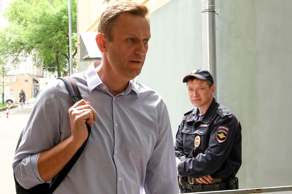 (FILE PHOTO) In this file photo taken on May 15, 2018 Russian opposition leader Alexei Navalny, who was detained during May 5 anti-Putin rally, arrives at the courthouse in Moscow.  AFP / Kirill KUDRYAVTSEV