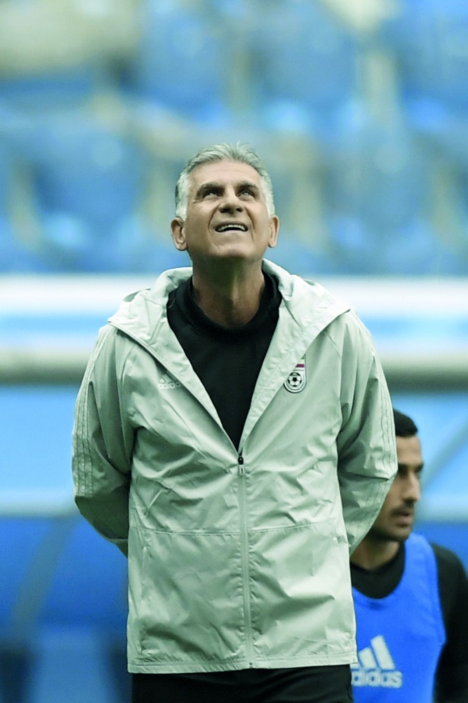 Iran's coach Carlos Queiroz leads a training session at Saint Petersburg Stadium on June 14, 2018, ahead of the Russia 2018 World Cup football game Iran vs Morocco.  AFP / Gabriel Bouys

