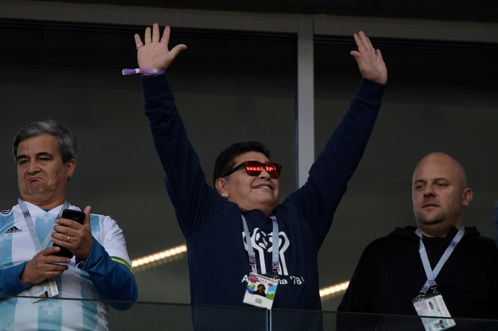 Argentina's football legend Diego Maradona waves to the crowd ahead of the Russia 2018 World Cup Group D football match between Argentina and Iceland at the Spartak Stadium in Moscow on June 16, 2018. AFP / Juan Mabromata 