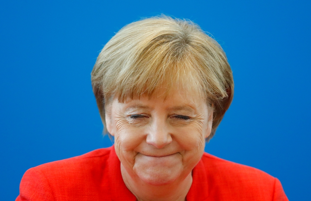 German Chancellor Angela Merkel reacts as she attends the board meeting of Germany's Christian Democratic Union (CDU) in Berlin, Germany, June 18 2018. REUTERS/Hannibal Hanschke 