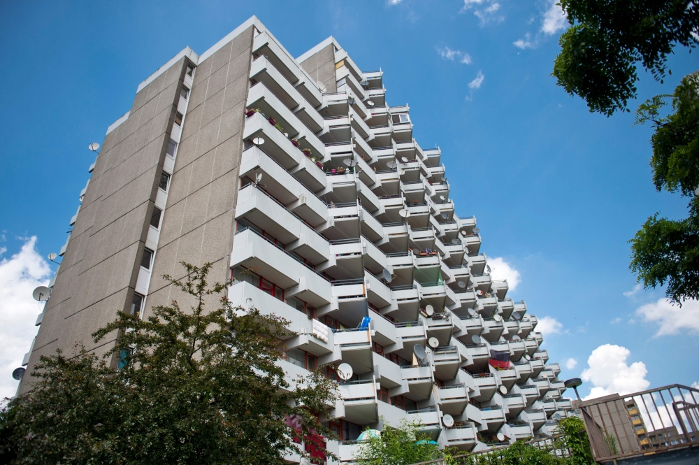 (FILE PHOTO) This file photo taken on June 15, 2018 shows an apartment building in Cologne's Chorweiler district, where a Tunisian suspected of trying to build a biological weapon was arrested.  AFP / MICHAEL GOTTSCHALK