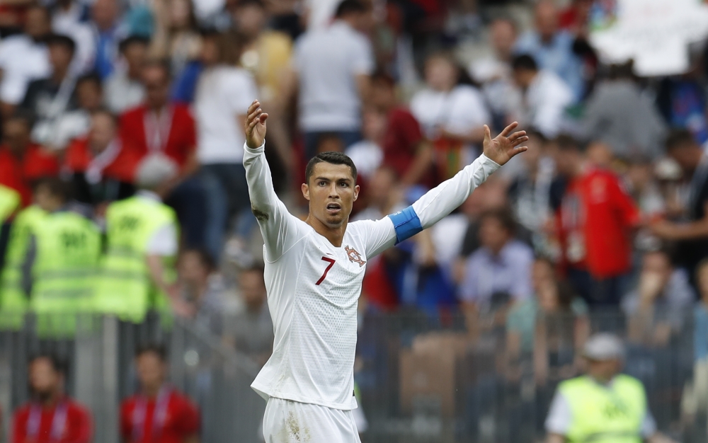 Cristiano Ronaldo of Portugal celebrates after winning the match at the end of the 2018 FIFA World Cup Russia Group B match between Portugal and Morocco at the Luzhniki Stadium Moscow in Russia on June 20, 2018. Sefa Karacan - Anadolu 
