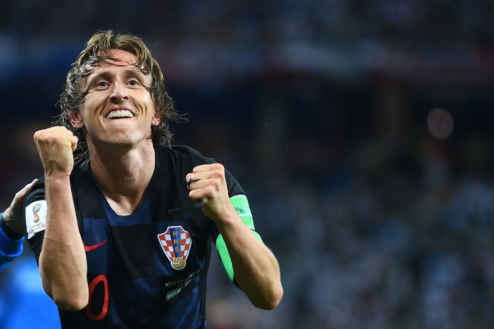 Croatia's midfielder Luka Modric celebrates after scoring their second goal during the Russia 2018 World Cup Group D football match between Argentina and Croatia at the Nizhny Novgorod Stadium in Nizhny Novgorod on June 21, 2018.  AFP / Johannes Eisele