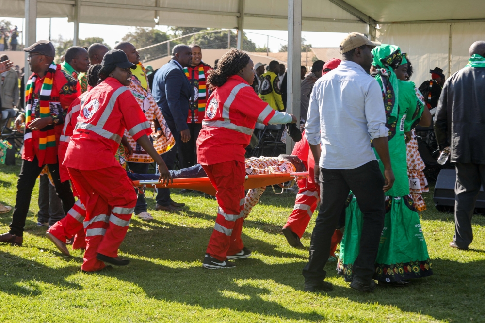 Medics attend to people injured in an explosion during a rally by Zimbabwean President Emmerson Mnangagwa in Bulawayo, Zimbabwe June 23, 2018. Tafadzwa Ufumeli/via REUTERS 