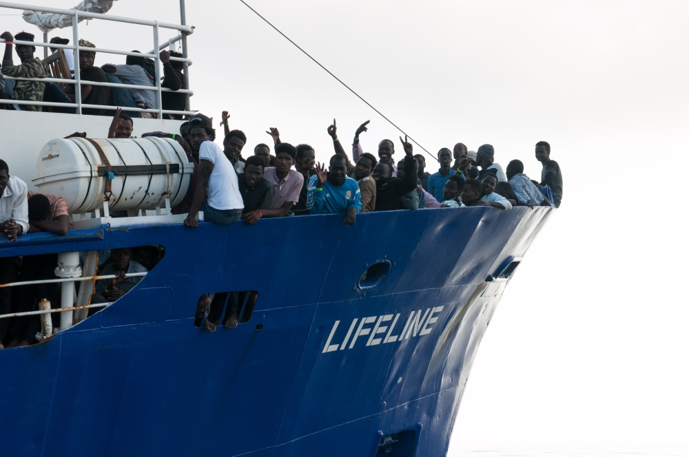 This handout picture obtained on June 22, 2018 from the German NGO Mission Lifeline shows migrants onboard the Lifeline sea rescue boat at sea on June 21, 2018. AFP PHOTO / MISSION LIFELINE