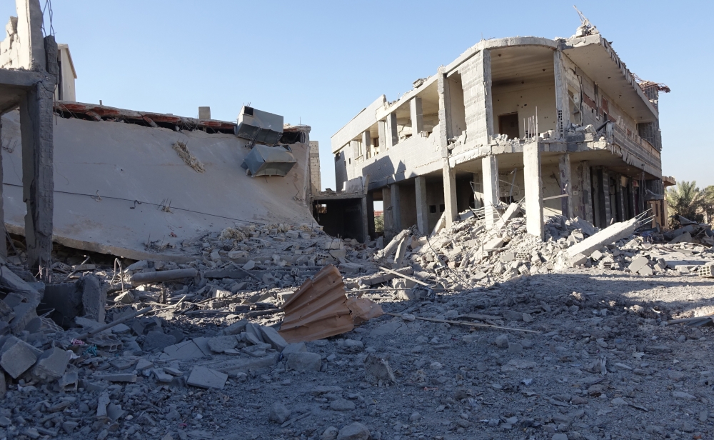 Destroyed buildings are seen after Assad Regime and its supporters carried out an airstrike over opposition controlled Daraa, Syria on June 25, 2018. Ammar Al Ali - Anadolu
