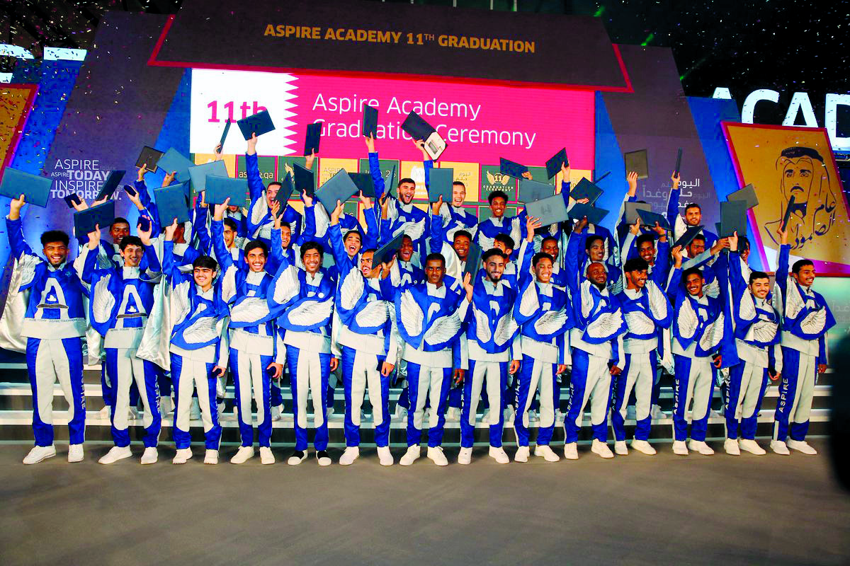 Student-athletes of Aspire Academy celebrate during their graduation ceremony in Doha, yesterday. 