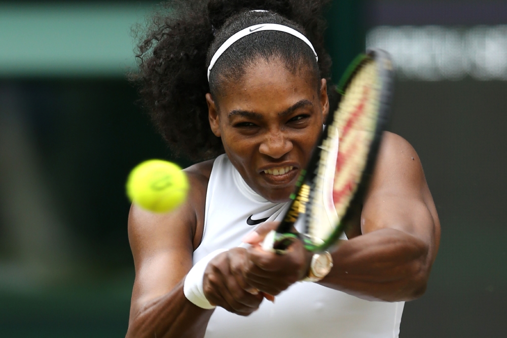(FILES) In this file photo taken on July 09, 2016 US player Serena Williams returns against Germany's Angelique Kerber during the women's singles final on the thirteenth day of the 2016 Wimbledon Championships at The All England Lawn Tennis Club in Wimble