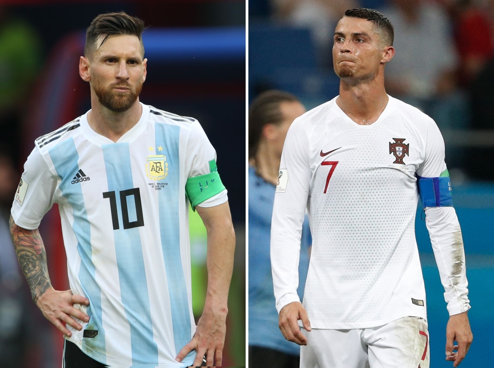 This combination of pictures shows Argentina's forward Lionel Messi (L) in Kazan on June 30, 2018 and Portugal's forward Cristiano Ronaldo in Sochi on June 30, 2018.(AFP / Roman KRUCHININ and Adrian DENNIS)