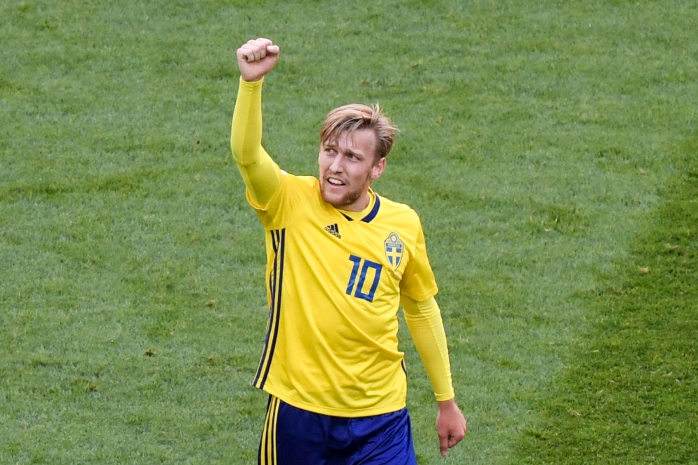 Sweden's midfielder Emil Forsberg celebrates after scoring during the Russia 2018 World Cup round of 16 football match between Sweden and Switzerland at the Saint Petersburg Stadium in Saint Petersburg on July 3, 2018. AFP / Gabriel Bouys 