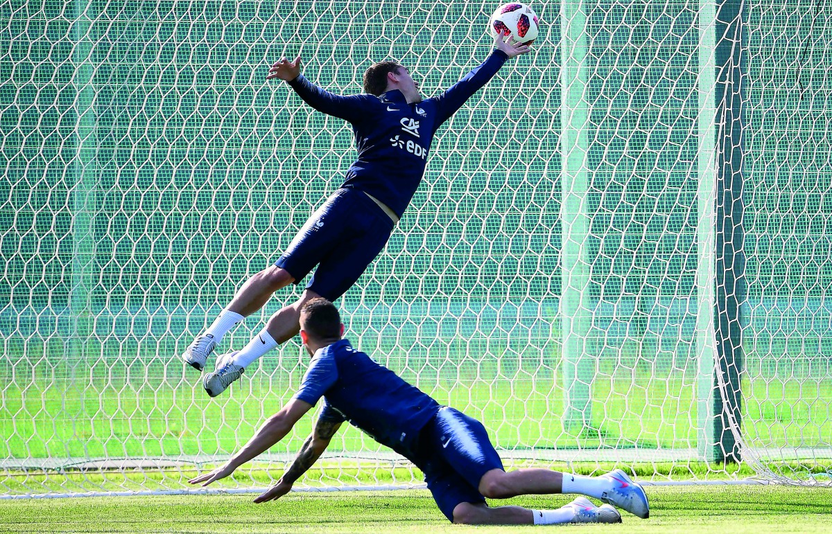 France's forward Antoine Griezmann (R) vies with France's defender Lucas Hernandez during a training session at the Glebovets stadium in Istra, some 70 km west of Moscow on July 12, 2018, ahead of their Russia 2018 World Cup final football match against C