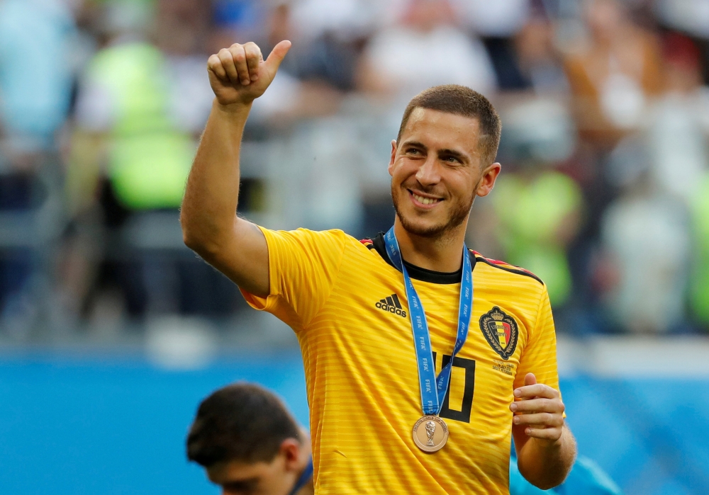 Belgium's Eden Hazard celebrates with a medal after the match, July 14, 2018. REUTERS/Toru Hanai/File Photo
