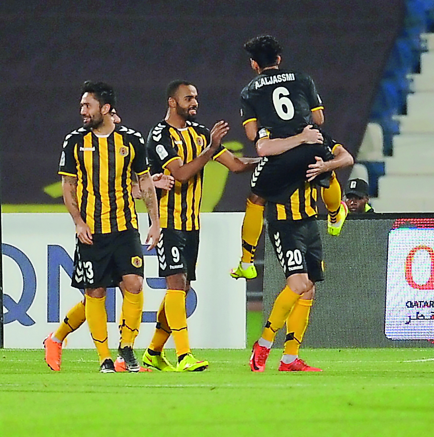 Qatar SC pleyers celebrate after scoring a goal during the previous QNB Stars League season in this file photo.
