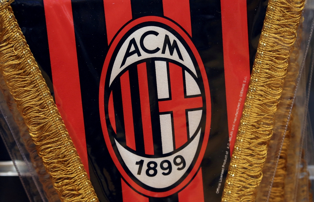 The AC Milan logo is pictured on a pennant in a soccer store in downtown Milan, Italy April 29, 2015. REUTERS/Stefano Rellandini