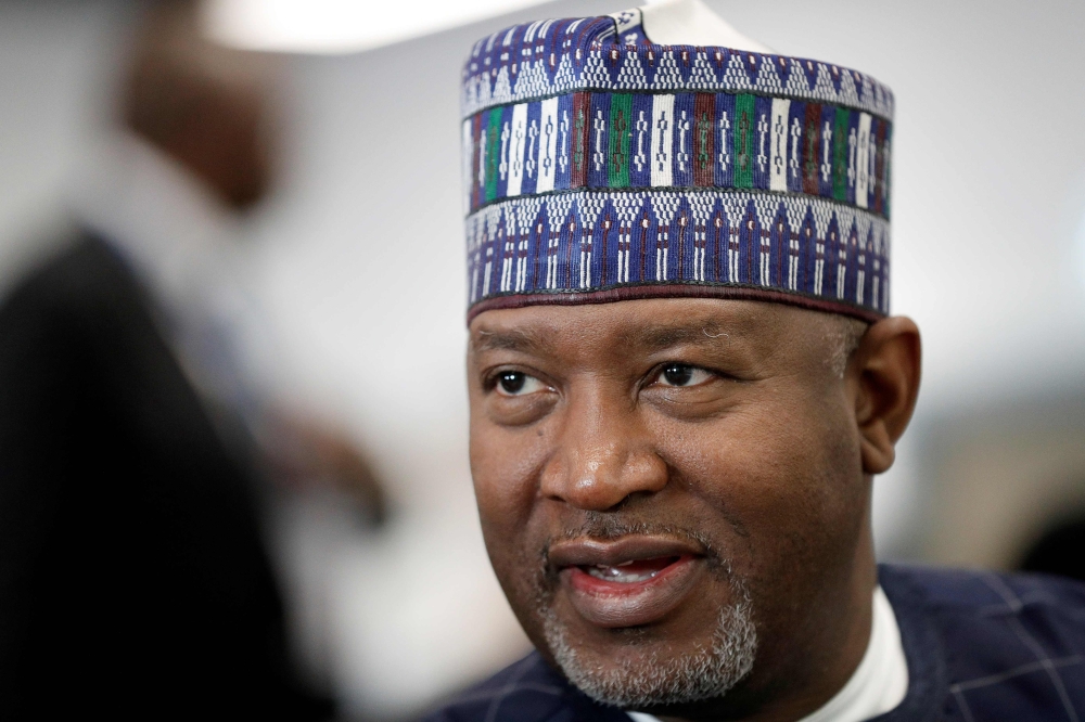 Nigeria's Aviation minister Hadi Sirika speaks folloing a press conference at the Farnborough Airshow, south west of London, on July 18, 2018.  AFP / Adrian Dennis