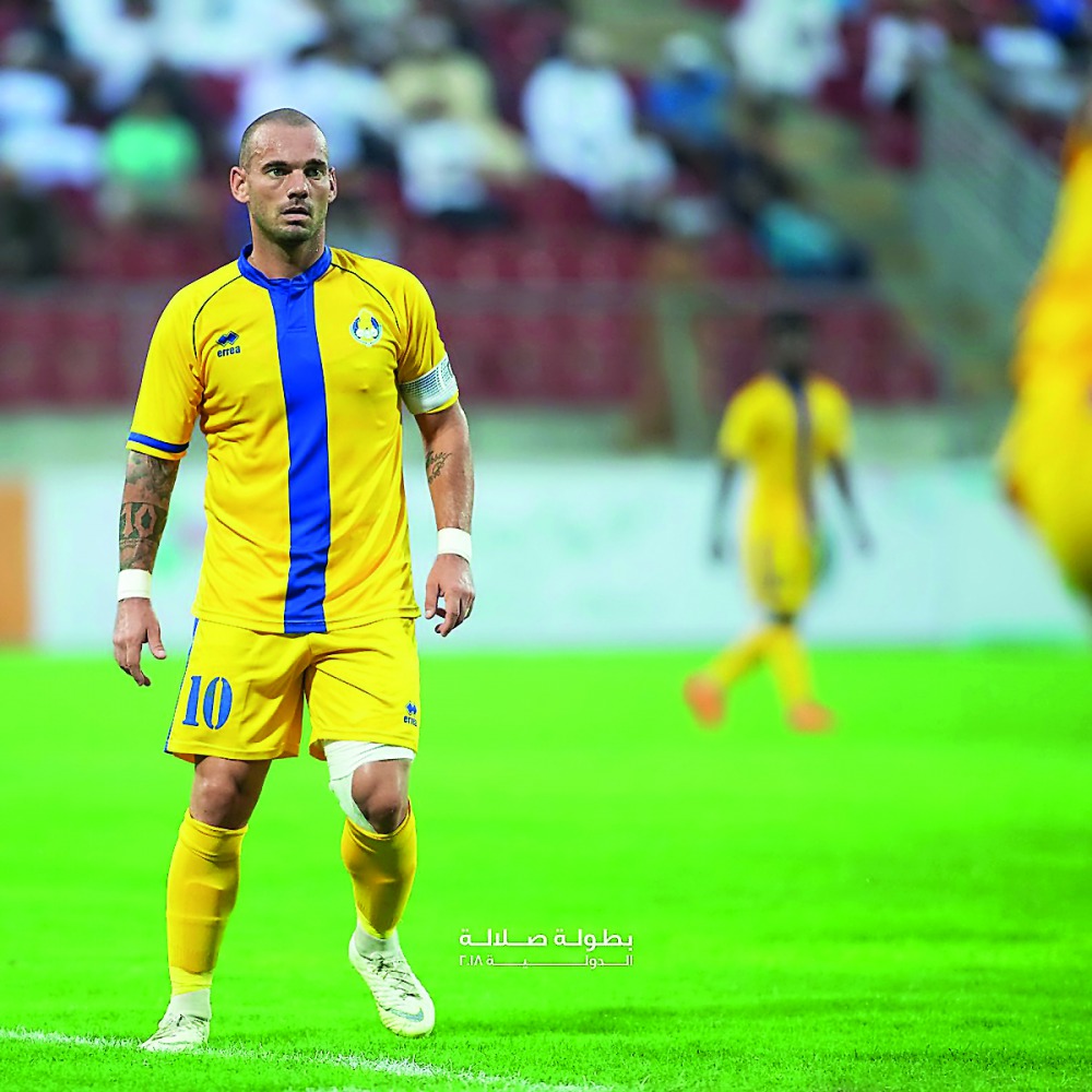 Al Gharafa’s Dutch star Wesley Sneijder reacts during the Friendly Football Tournament in Oman. Sneijder scored three goals in two matches to become the top scorer in the tournament which saw four teams competing.