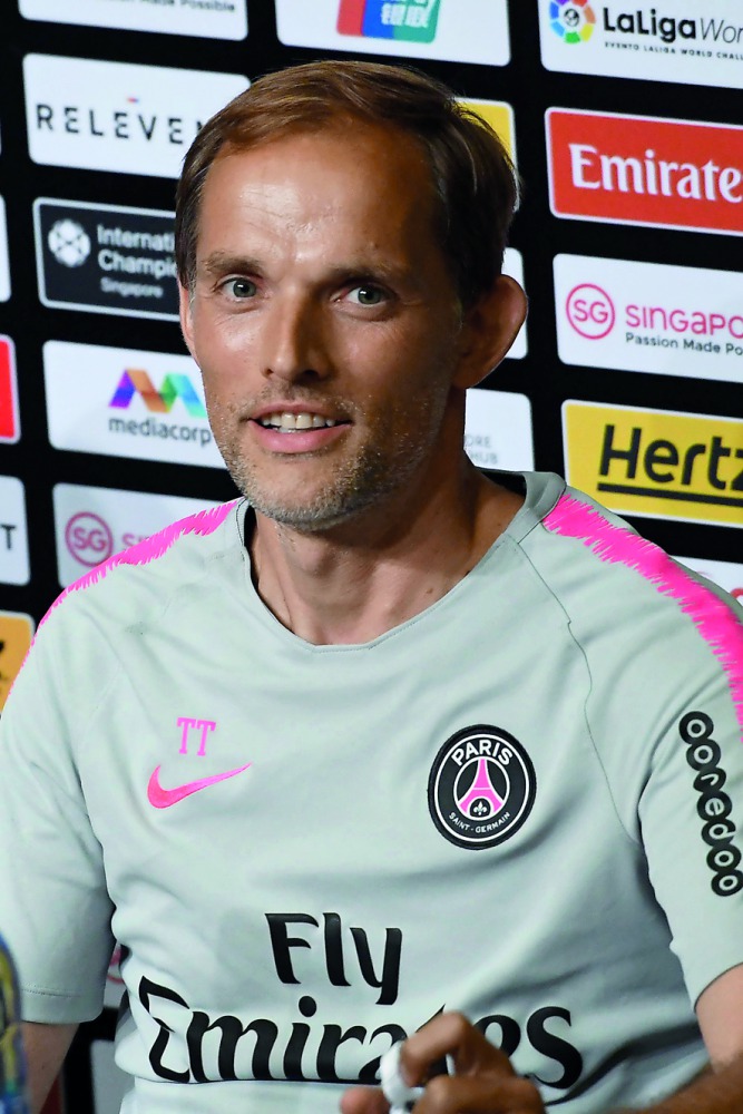 Paris Saint Germain's head coach Thomas Tuchel attends a press conference ahead of their International Champions Cup football match in Singapore on July 27, 2018.  AFP / Roslan Rahman
