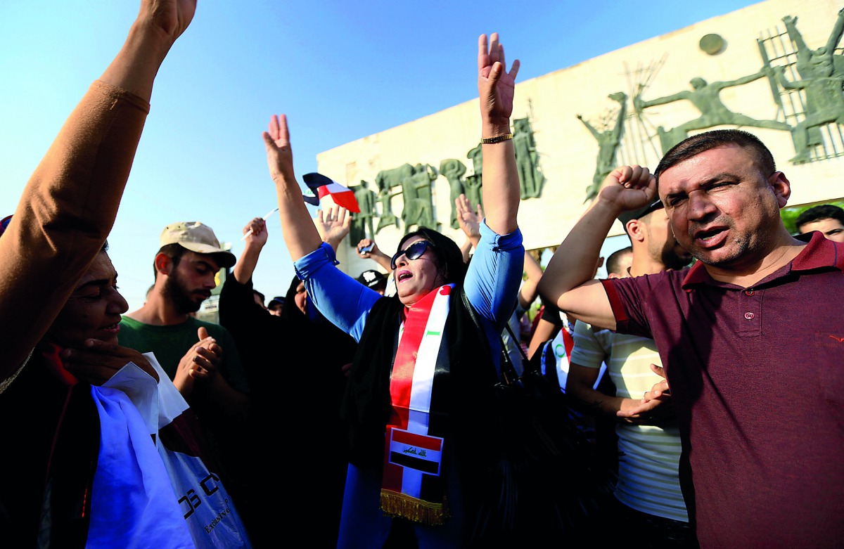People shout slogans during a protest at Tahrir Square in Baghdad, Iraq July 27, 2018. Reuters/Thaier al-Sudani