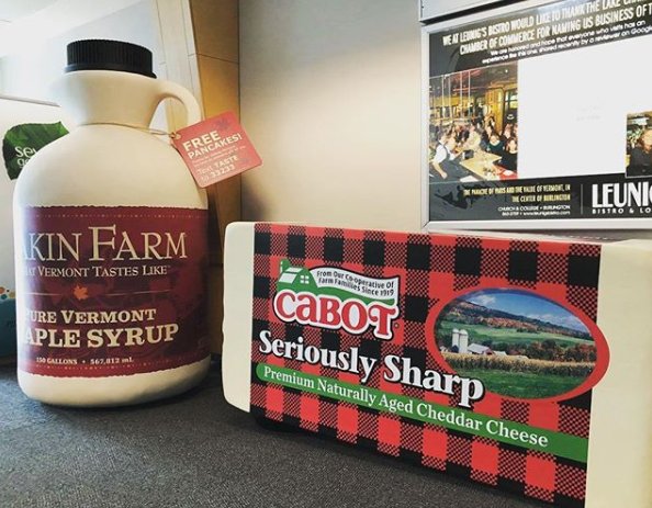 A Vermont airport is displaying 7-foot-tall maple syrup jugs to remind travellers they can buy the state staple online instead of losing it at security when their liquids get confiscated. (Photo courtesy:  Dakin Farm via Instagram)