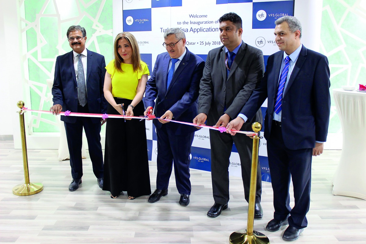 Ambassador of Turkey to Qatar, Fikret Ozer, with other officials during the opening of VFS Global visa application  centre after expansion in Al Matar Street. 