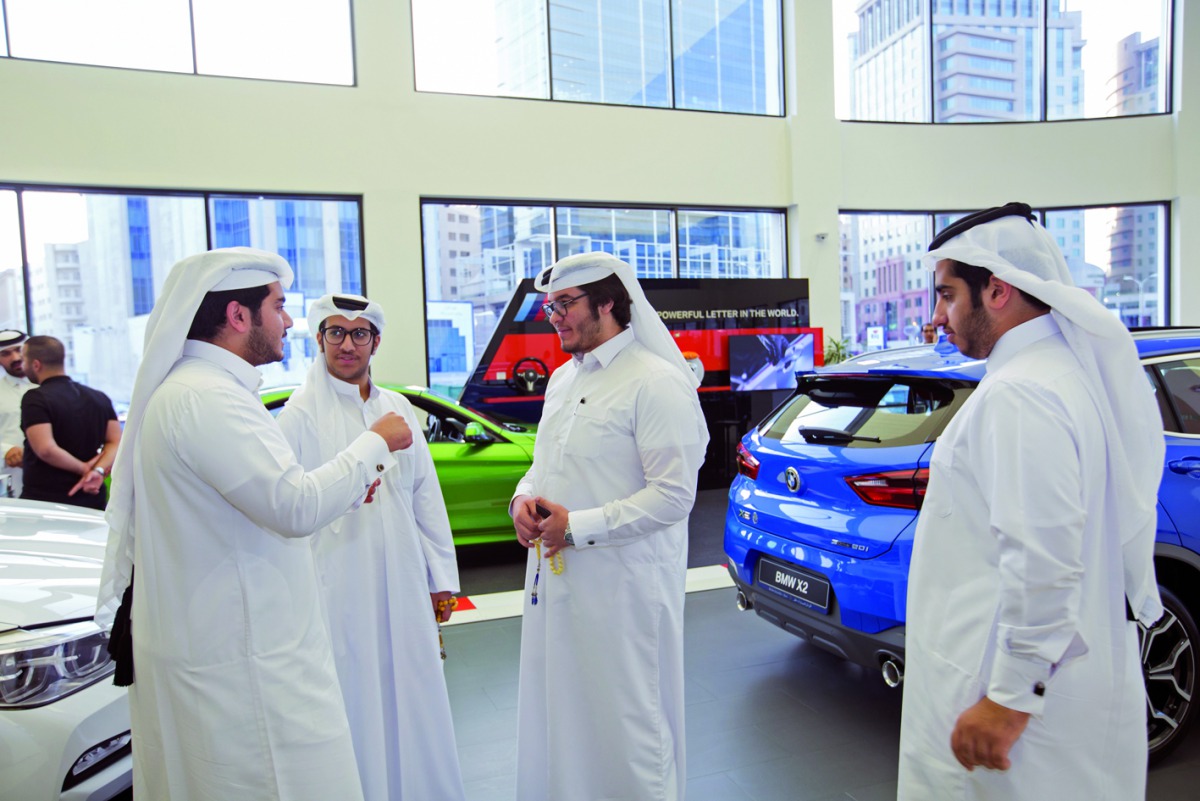 The officials of Alfardan Automobiles during a talk on the screening of the movie. 