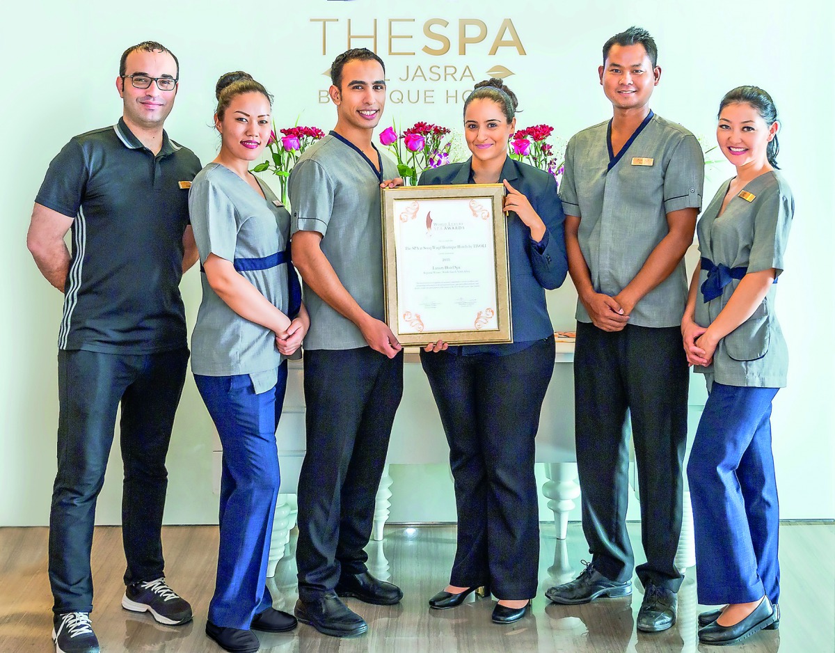 The team which offers spa service at Souq Waqif Boutique Hotels by Tivoli with the award. 