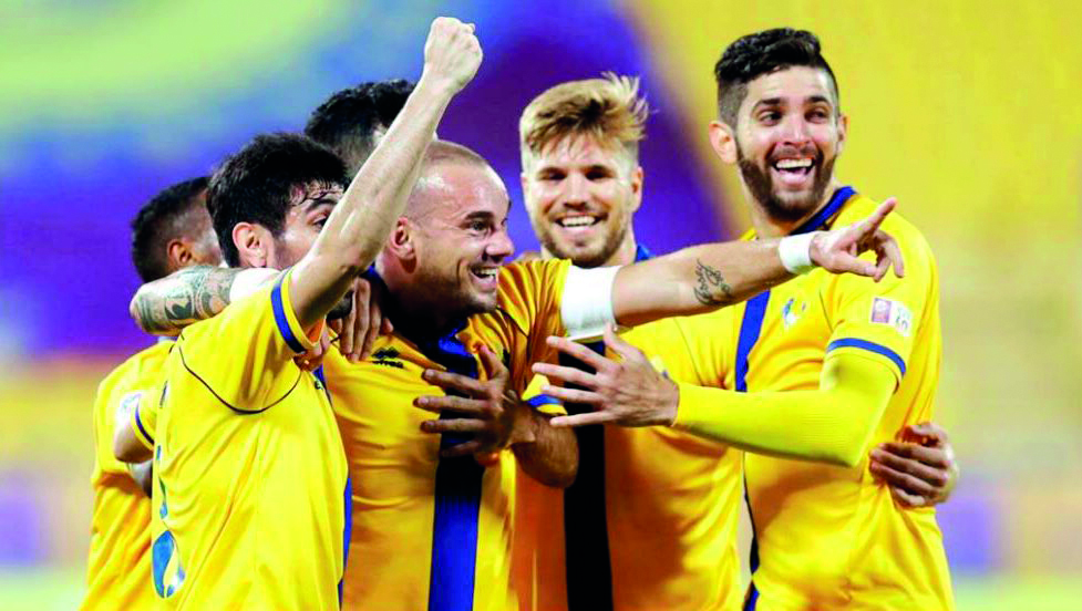 Al Gharafa players celebrate after scoring a goal during the previous QNB Stars League in this file photo.
