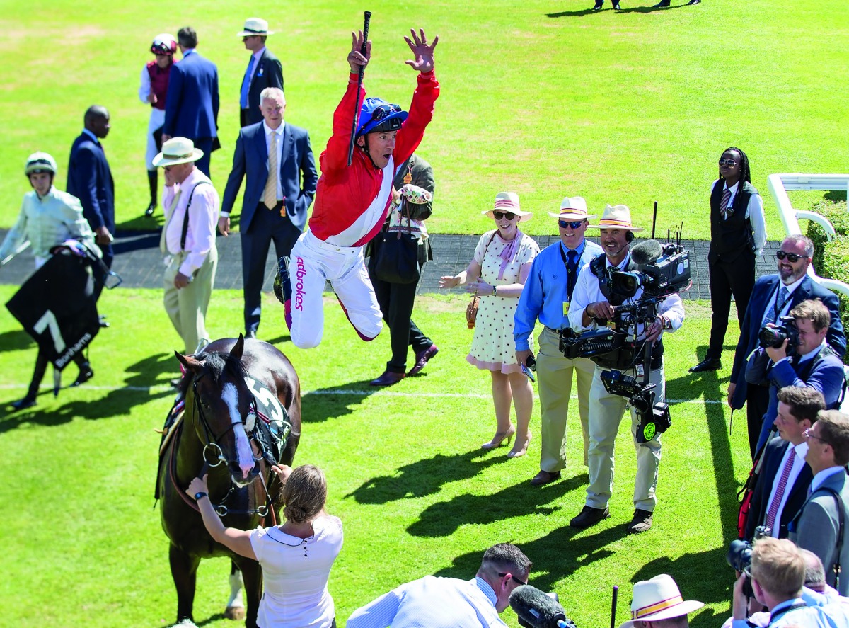 Regal Reality’s jockey  L Dettory celebrates after winning the Bonhams Thoroughbred Stakes (G3) yesterday.