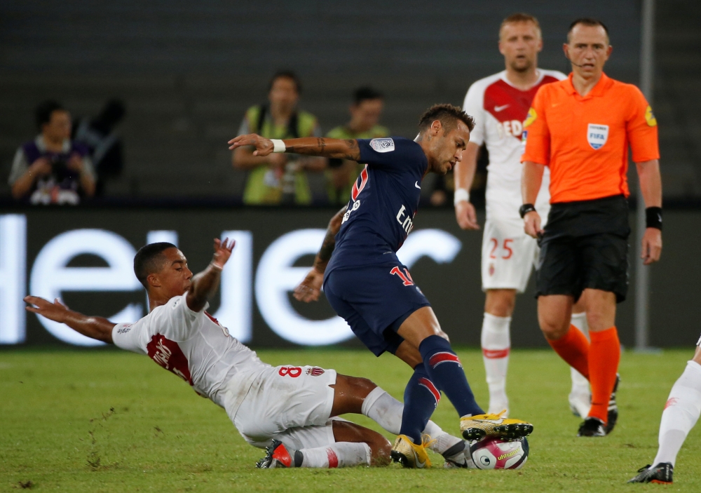 Paris St Germain's Neymar in action with AS Monaco's Youri Tielemans (REUTERS/Bobby Yip)