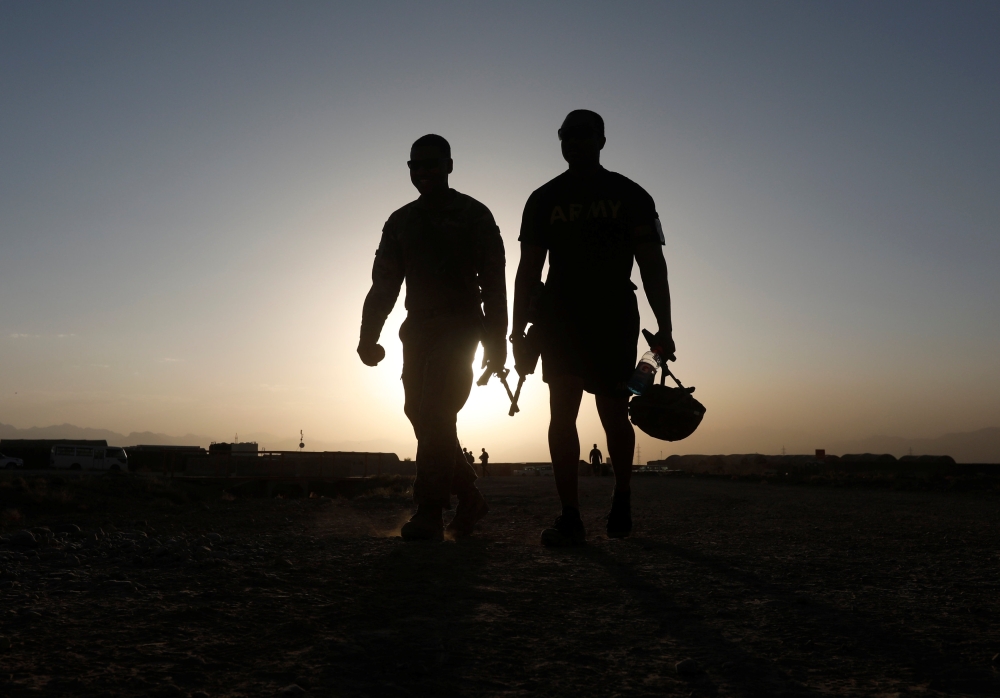 U.S troops walk at their base in Logar province, Afghanistan August 4, 2018. (REUTERS/Omar Sobhani)