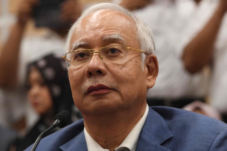 File photo of former Malaysian prime minister Najib Razak attending a press conference to announce his resignation as president of the United Malays National Organisation (UMNO), the main component party of the defeated Barisan Nasional (BN) coalition, in