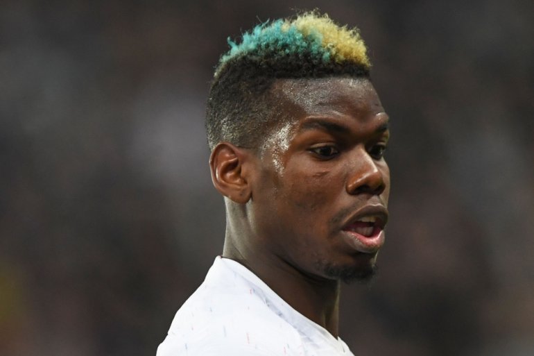 File photo of France's midfielder Paul Pogba during an international friendly football match between Russia and France at the Saint Petersburg Stadium in Saint Petersburg on March 27, 2018. / AFP / Kirill KUDRYAVTSEV