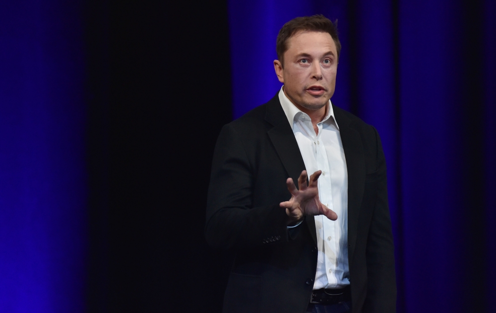 Elon Musk speaks at the 68th International Astronautical Congress 2017 in Adelaide on September 29, 2017. AFP/Peter Parks