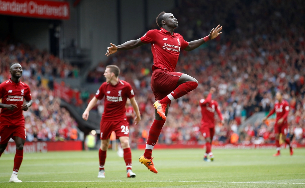 Liverpool's Sadio Mane celebrates scoring their third goal. (Reuters/Carl Recine)