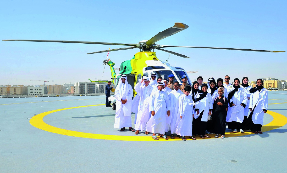Participants at the HMC summer camp during a session about the functions of Ambulance Service’s  LifeFlights, yesterday. Pic: Baher Amin / The Peninsula
