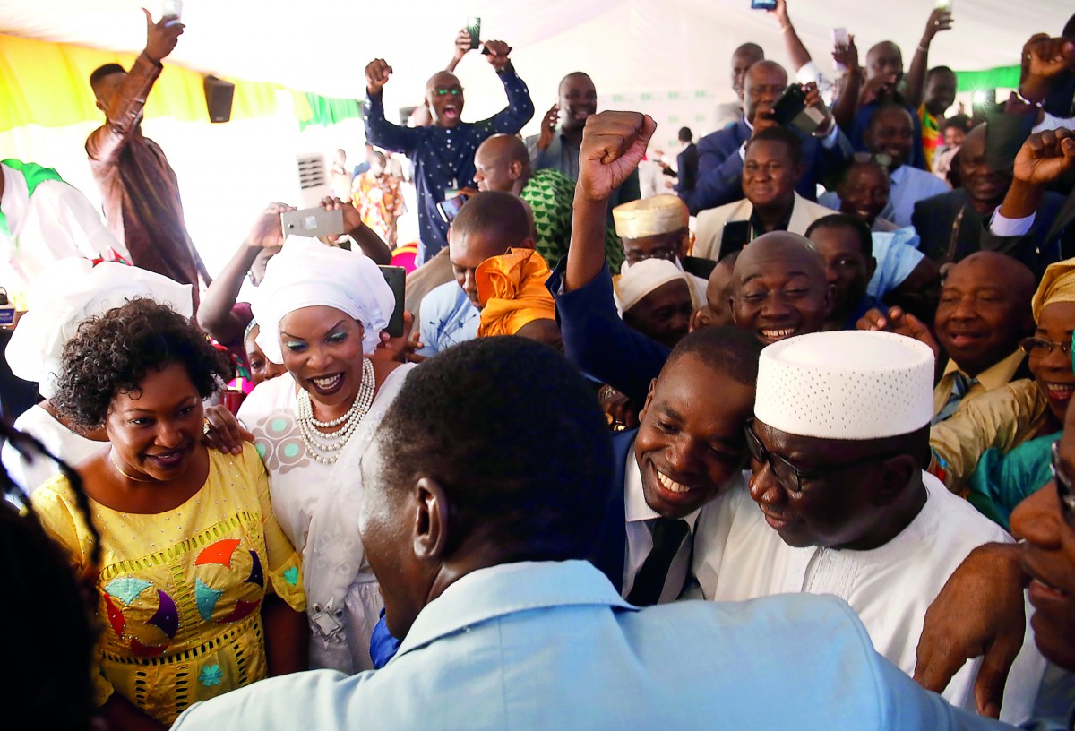 Supporters of Malian President Ibrahim Boubacar Keita celebrate at the Rally for Mali (RPM) party's headquarters in Bamako, Mali August 16, 2018. Reuters/Luc Gnago