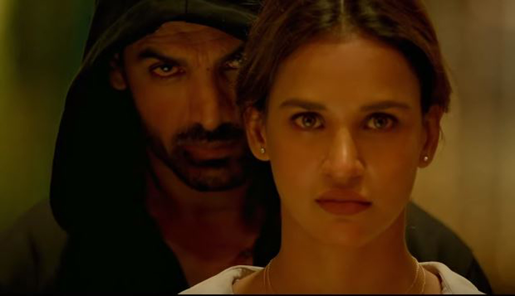 Still of the actors John Abraham (L) and Aisha Sharma from the movie Satyameva Jayate.