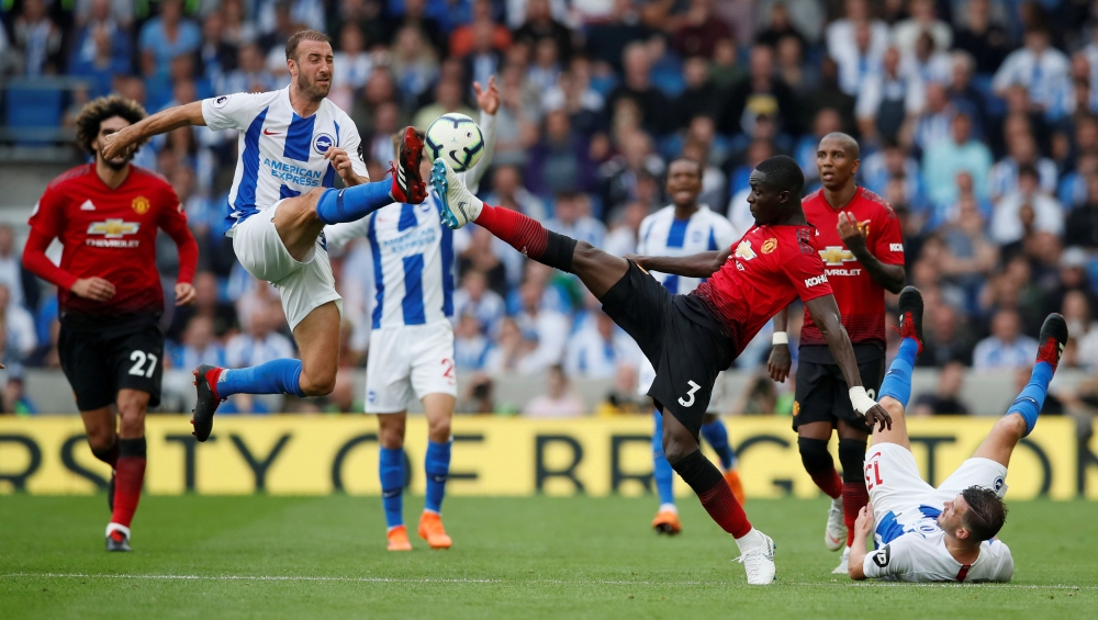 Brighton's Glenn Murray in action with Manchester United's Eric Bailly (REUTERS/David Klein)