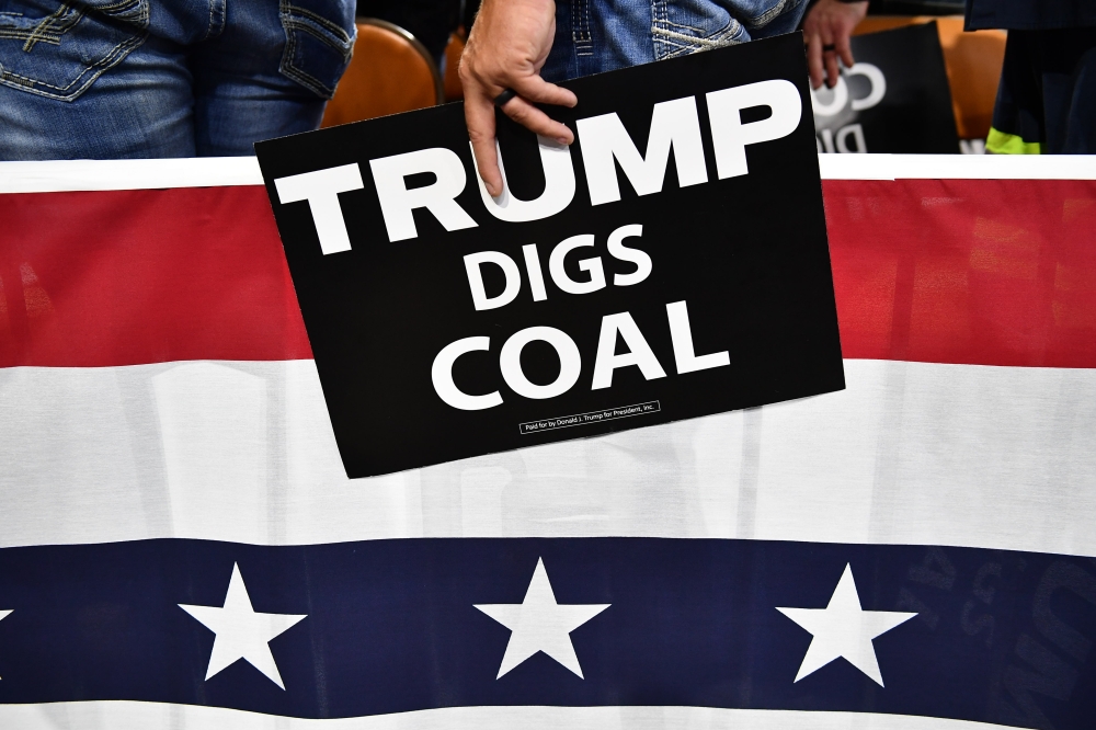 Supporters of US President Donald Trump attend a political rally at Charleston Civic Center in Charleston, West Virginia, on August 21, 2018. AFP / Mandel Ngan
 