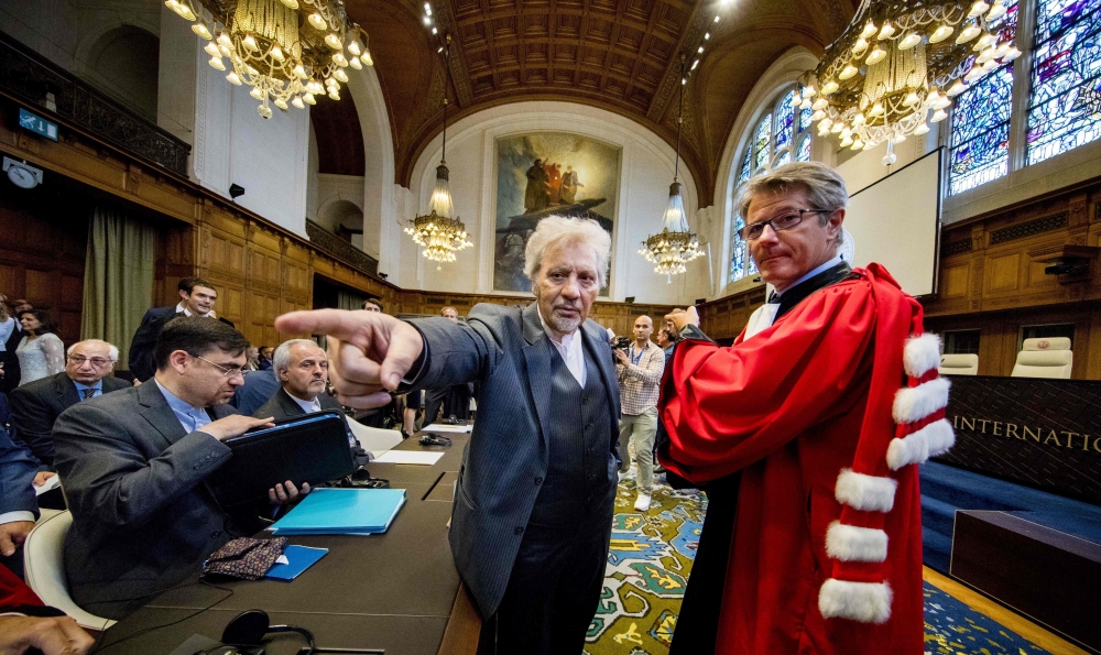Mohsen Mohebi, representative of Iran, is pictured during the opening of case between Iran and the United States at the The International Court of Justice (ICJ) in the Hague, August 27, 2018. Iran opened a lawsuit demanding the UN's top court order the su