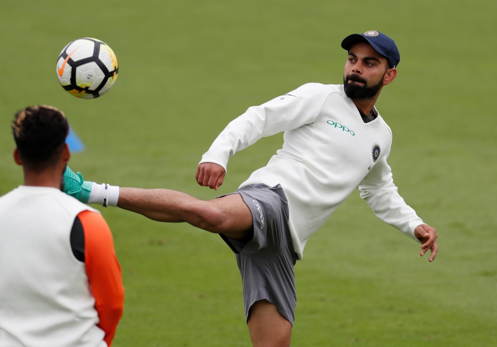 India's Virat Kohli playing football during training. (Reuters/Paul Childs)