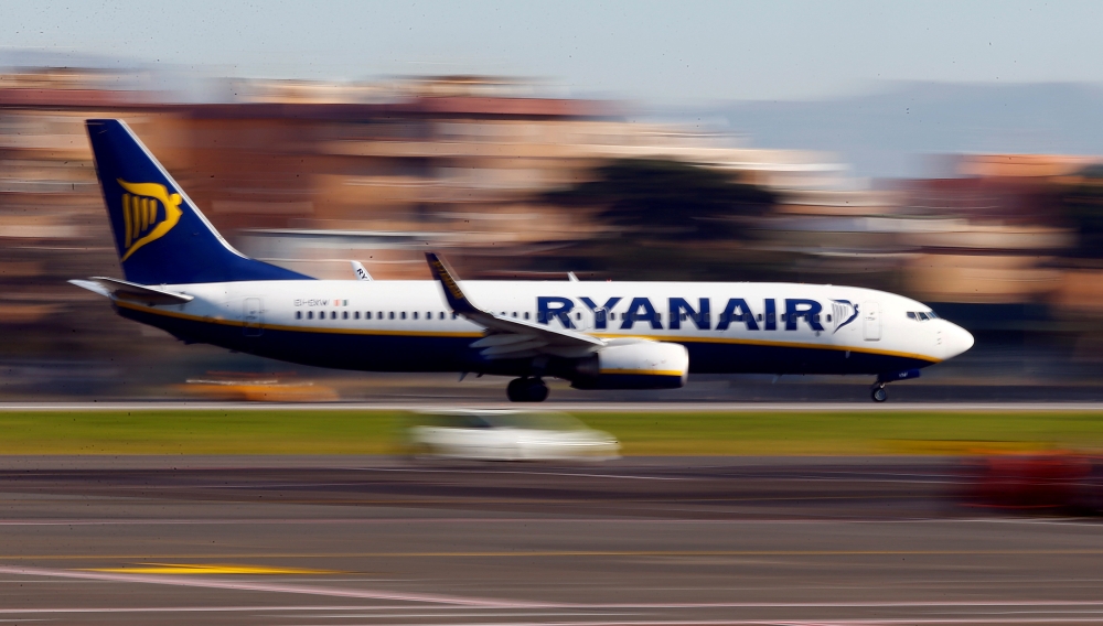 FILE PHOTO: A Ryanair aircraft lands at Ciampino Airport in Rome, Italy December 24, 2016. REUTERS/Tony Gentile
