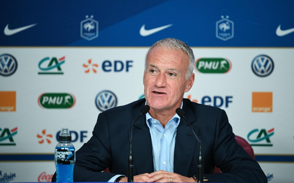 French national football team coach Didier Deschamps talks during a press conference in Paris on August 30, 2018 to announce the names of the 23 players selected for the Nations League football match against Germany and The Netherlands. / AFP / FRANCK FIF