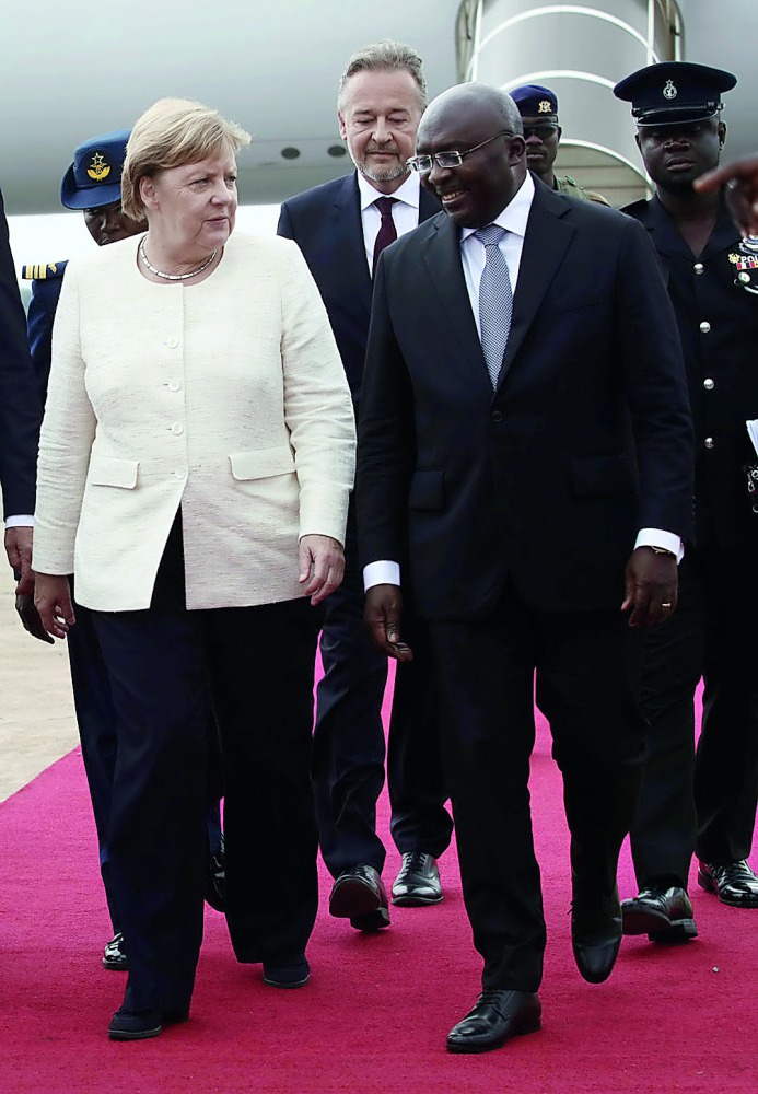German Chancellor Angela Merkel is welcomed by Ghana's Vice President Bawumia at the Jubilee Airport in Accra, Ghana August 30, 2018. Reuters/Francis Kokoroko 
