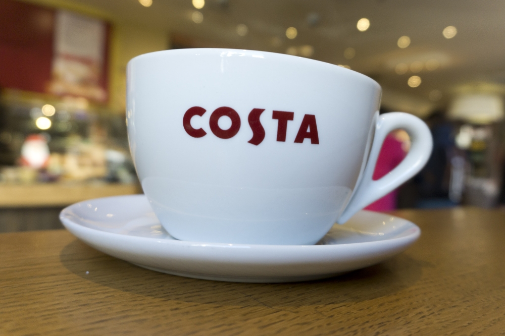 In this file photo taken on November 17, 2017 a mug of coffee is pictured inside a branch of a Costa coffee shop in London. Coca-Cola on August 31, 2018 said it had agreed to buy global coffee chain Costa from its owner Whitbread for £3.9 billion ($5.1 bi