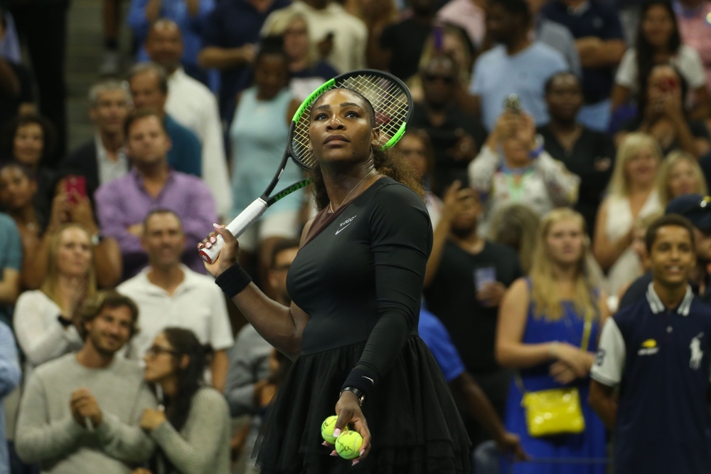 Serena Williams of USA in action against Venus Williams (not seen) of USA in the Women's Singles round three match within the US Open 2018 tournament in Arthur Ashe Stadium in Flushing, New York, United States on August 31, 2018. ( Mohammed Elshamy - Anad