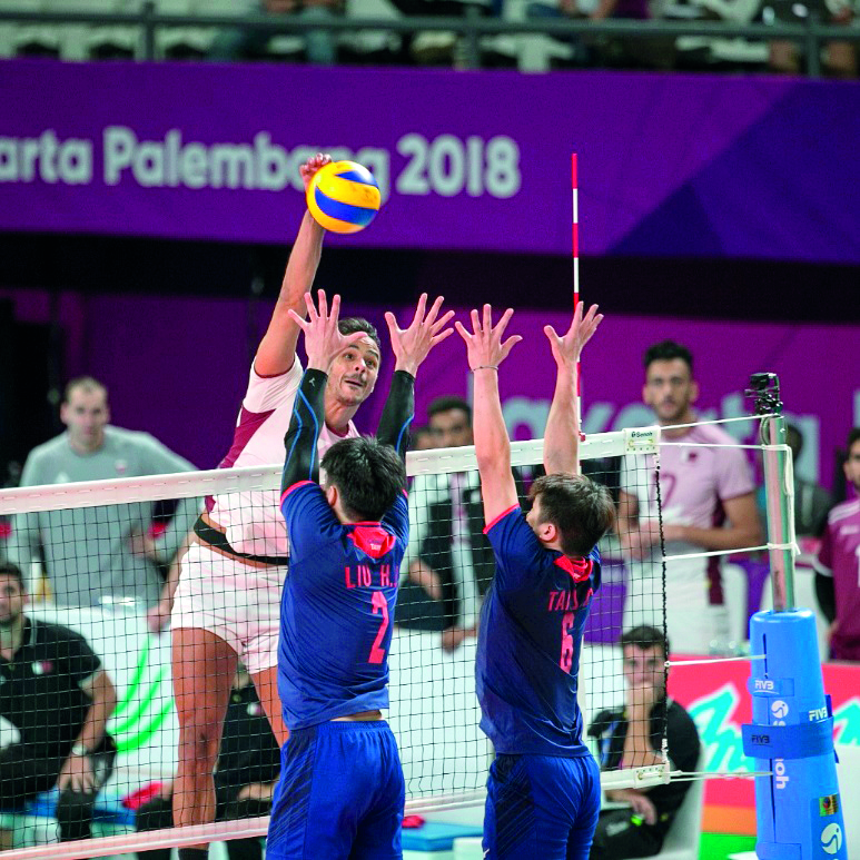 Qatar volleyball players during their third place play-off match against Chiense Taipei during the Asian Games.